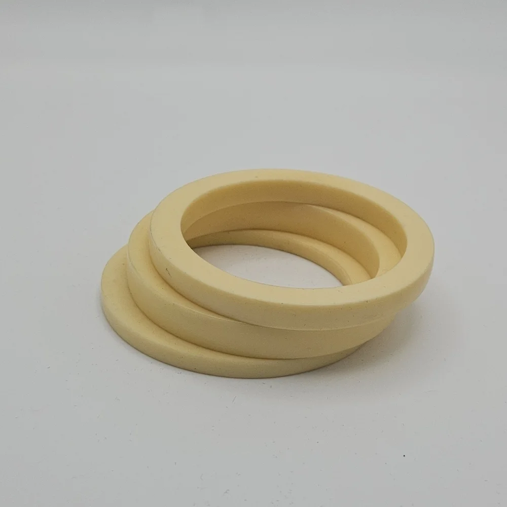 trio of ivory colored bangles